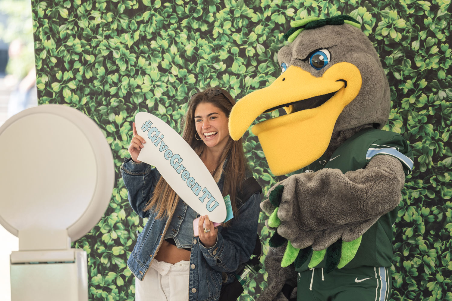Riptide posing with student
