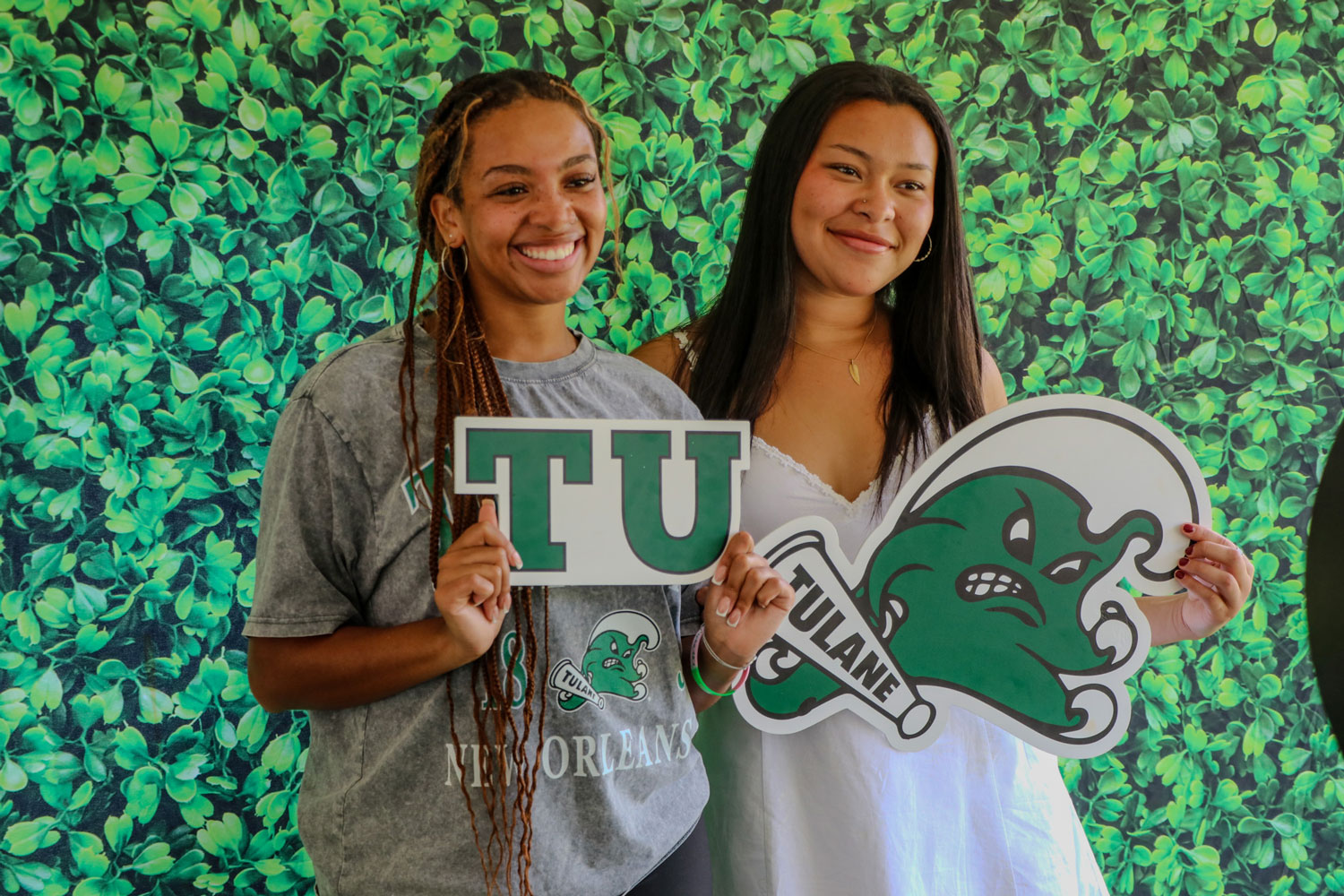 Students holding angry wave and TU signs