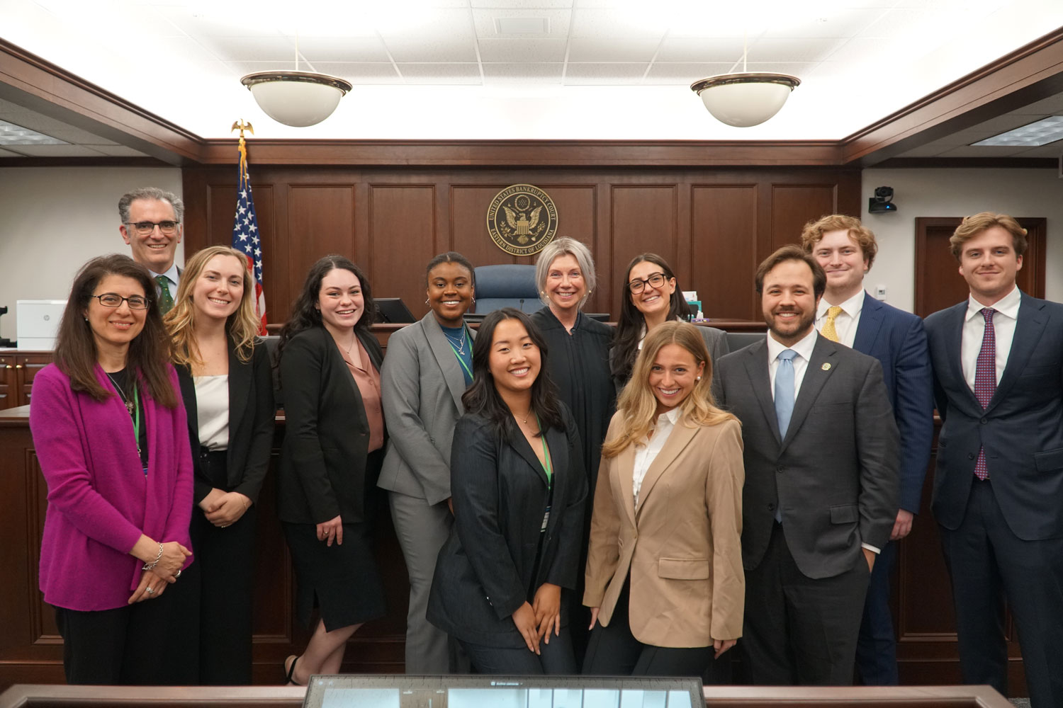 Tulane law students gathering with a judge